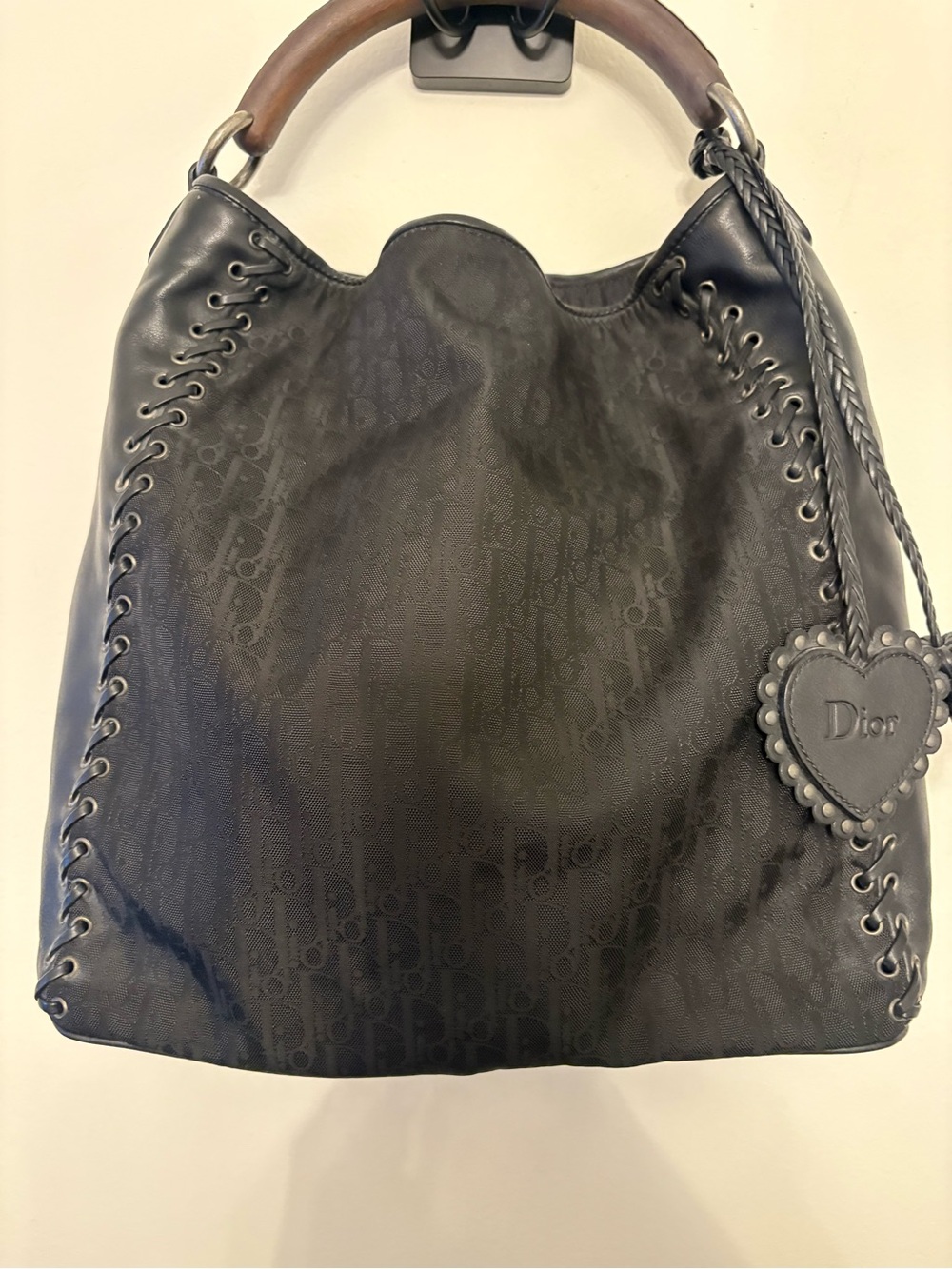 CHRISTIAN DIOR
Brown Diorissimo Nylon And Leather Grommet Heart Charm hobo bag